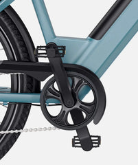 Close-up of a bicycle's gear system on a light gray background