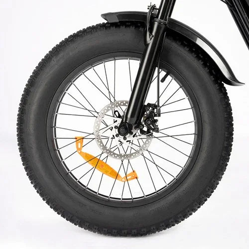 Close-up of a bicycle wheel with a white background