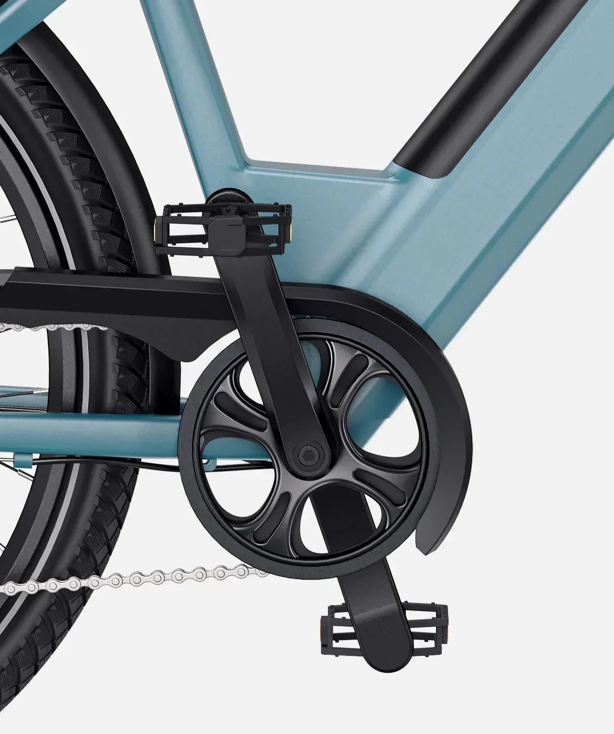 Close-up of a bicycle's gear system on a light gray background